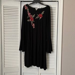 Size XL black flowing dress with bell sleeves.